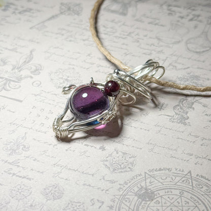 赤い銀河とガーネットのワイヤーラッピングペンダント